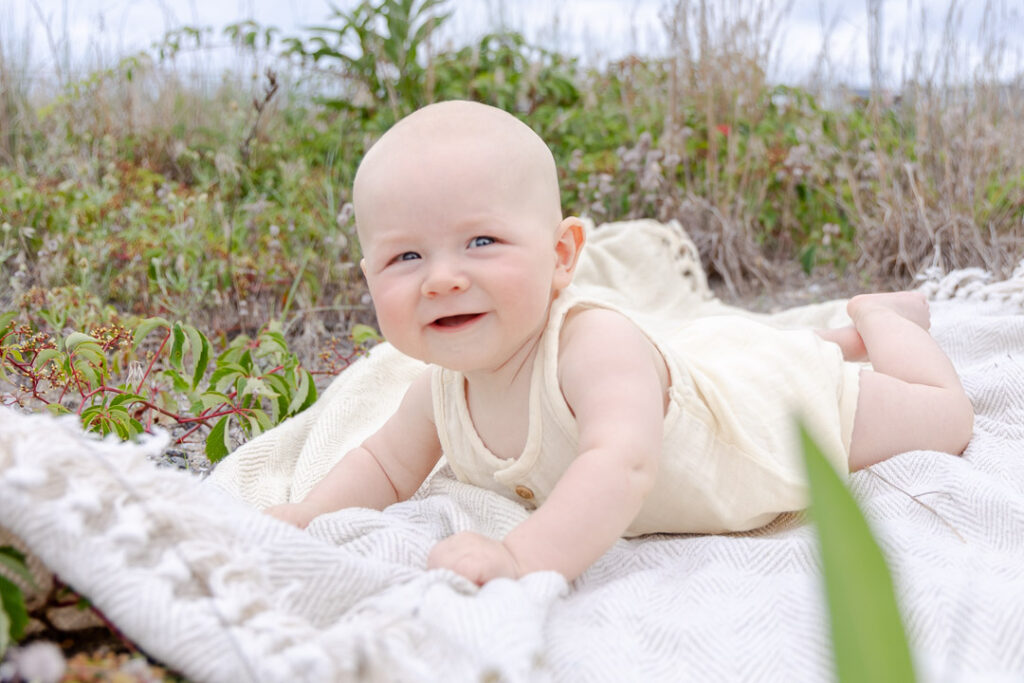 baby photoshoot tall grass