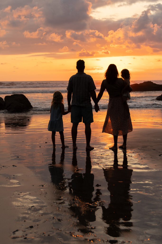 family silhouette beach costa rica