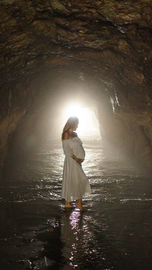 manifest ethereal beauty in a cave by the sea