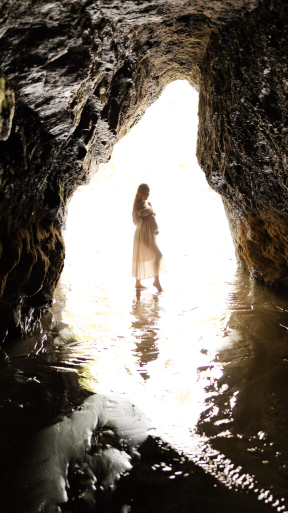 ethereal Maternity Photography in a cave 